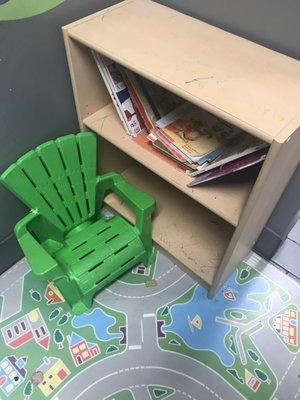 Kids play room with some books and city/car painted flooring - *bring your own cars*