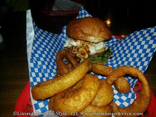 Cowboy burger with onion rings.