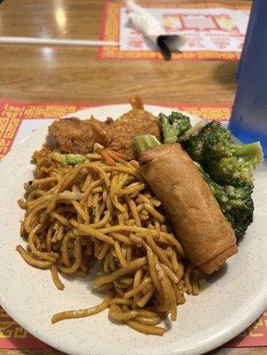 Noodles, egg roll, veggies, fried rice, fried shrimp