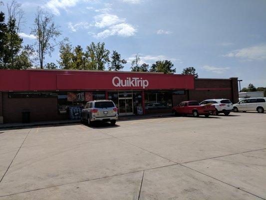 Outside the convenience store. Storefront. Entrance.