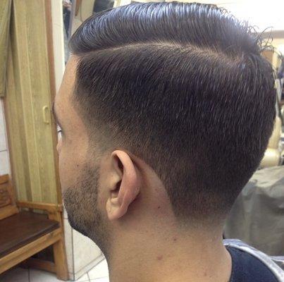 Tapered comb over.  Classic hair style.