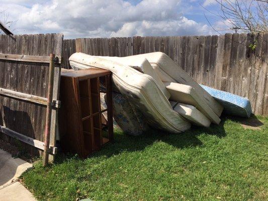 Abandoned furniture that sat around the garbage cans for almost two weeks. This definitely discouraged us from having guests over.