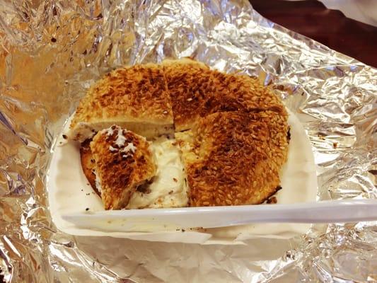 No better way to fix a rough morning than to down a delicious sesame seed bagel smothered in cream cheese.