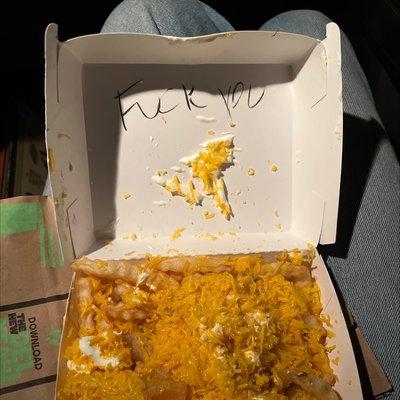 Went to del taco and this is what they gave me! I asked for cheesy fries and sour cream and i got this. DISGUSTING.