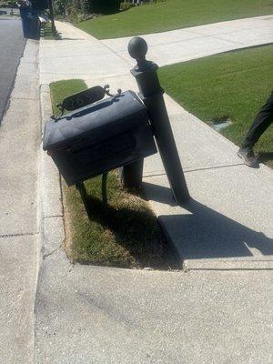 This is how the driver w/vine disposal left my mailbox after running it over.