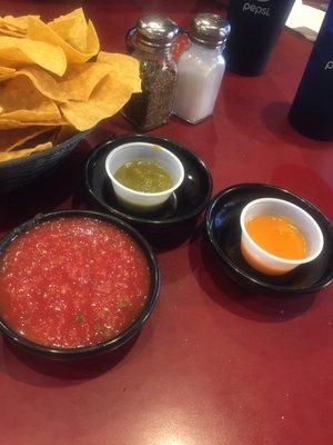 Ask for hot salsa - the orange is habanero, green is jalepeno, red is mild--mixed together is perfection!