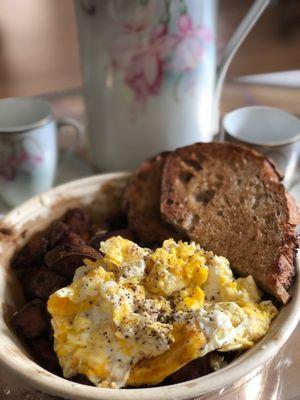 Sweet potato, scrabble egg and toast bowl.