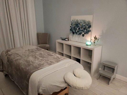 Relax in this beautiful massage room located inside Aidan James Salon!