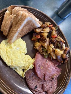 Scrambled Eggs Pork Roll and Home Fries with Peppers and Onions added