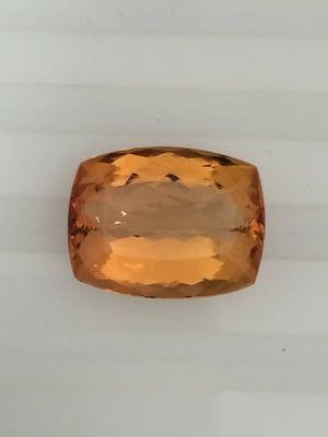 12 3/4 carat Imperial Topaz. How beautiful! Check out what other gemstones we have at Designer Jewels!