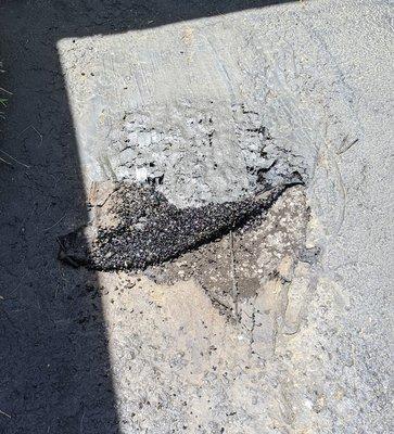 The pothole that they were supposed to fix.