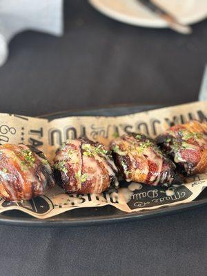 Dates wrapped in bacon