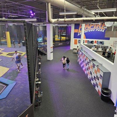 Trampoline area to left and locker rentals to the right.