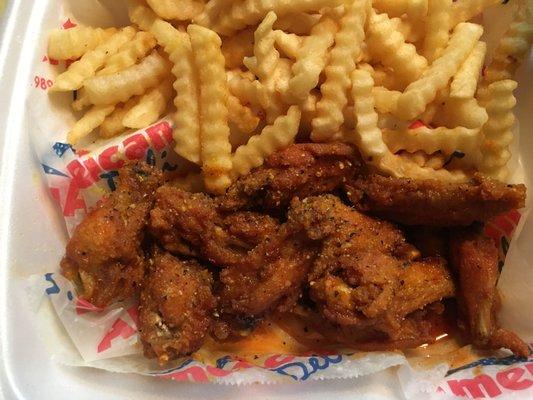 10 piece hot wing/ lemon pepper sprinkle combo with crinkly fries.