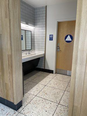 Open concept, sinks outside restrooms