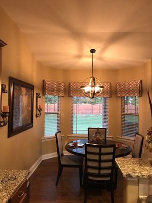 Window treatments by Fine Fabrics & Furnishings.