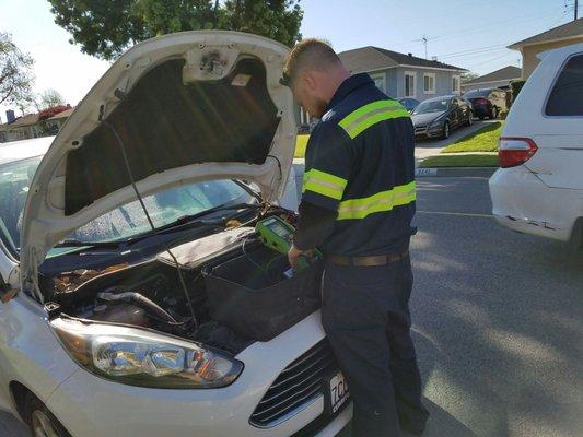 Anthony doing his thing running a battery test on my car. Him and Nick got it going.