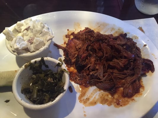 I ordered the pulled pork dinner with potato salad and collard greens. The pulled pork was excellent. Sweet, tender, and juicy.