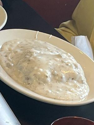 Close up of the sausage and gravy biscuit. Almost ordered this.