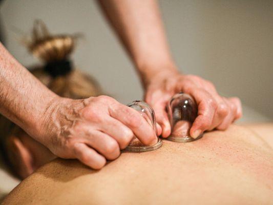 Massage with cupping enhancement