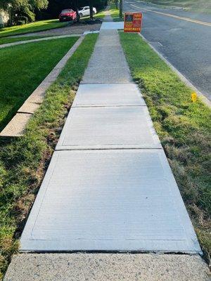 Fixed sidewalk slabs