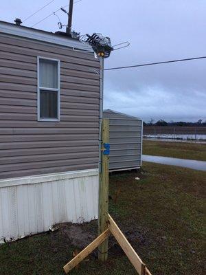 Mounted antenna.  Weather wouldn't allow concrete today.