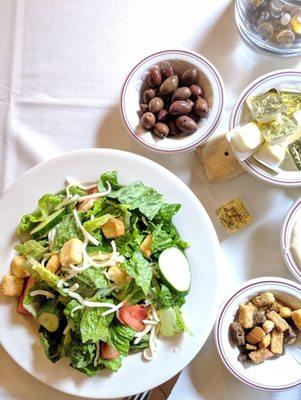 Caesar salad and olive bowl.