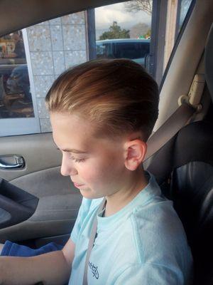 Love how they did my oldest son's hair. Totally obsessed with the cut.