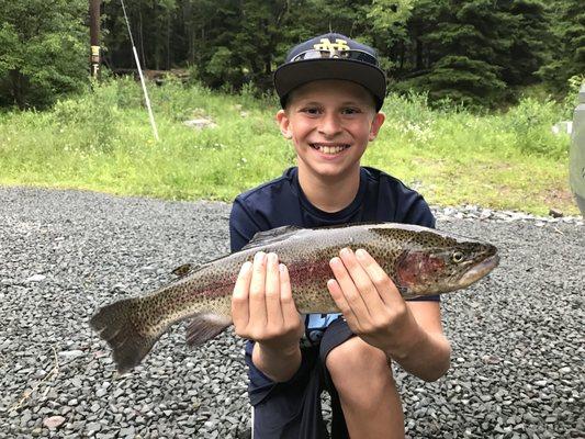 My 12 year old pounding his favorite spot with AA's beetles! 20+ rainbows and brooks in a couple of hours of work.