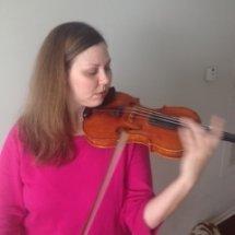 Jan teaches violin in Atlanta