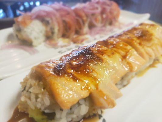 Volcano Roll- spicy tuna, albacore w/Baked Salmon on the outside.  One of our faves