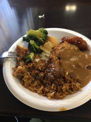 Lunch buffet items egg foo young patty with gravy, fried rice, beef and broccoli and general tsao . Hot and fresh during the lunch hour.