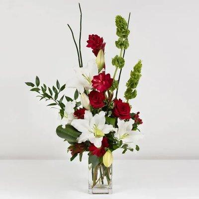 Blooming Fantasia red roses white lilies bells of ireland