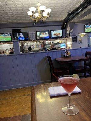 The seating area near the bar and a cosmo!