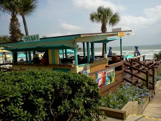 The tiki bar is very inviting with great drinks and sets at the edge of the ocean.