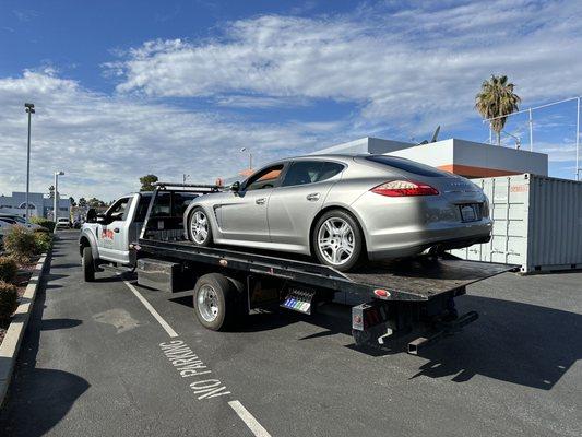 Car being towed.