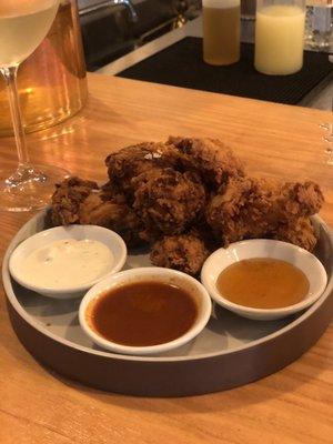 Fried Chicken Wings. Dipping sauces: blue cheese, Buffalo sauce, honey