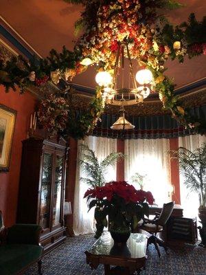 Christmas decor, this room in the style of old Christmas cards which sometimes featured flower motif