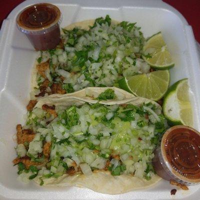 Albarnado (pork) tacos with extra onion & cilantro.