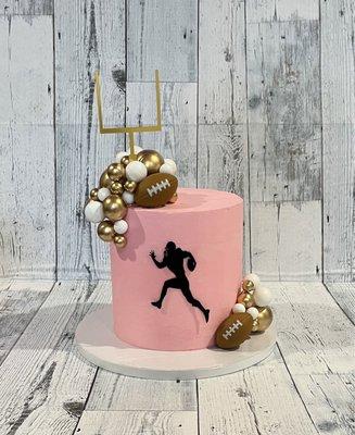 Custom pink football cake