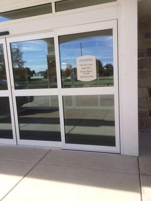 Entrance. Little sign explains that it is all together - Schowalter Villa and Hesston Bakery & Cafe. Hesston College is in walking distance.