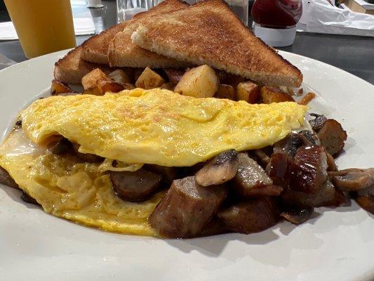 Omelette with mushroom, Swiss, and sausage