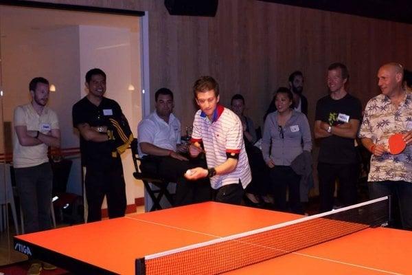 Entertaining a corporate party with some fancy serves... Playing "return a serve from a pro!" Always a crowd favorite!