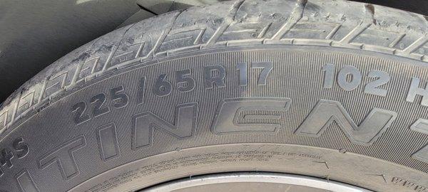 This tire is illegal and should not be on the road.