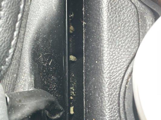 Chunks of marijuana left between seats from previous rental.