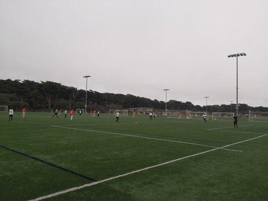 Actual soccer being played.  No masks.