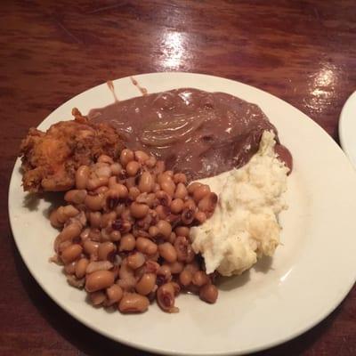 One of the loaded plates - Beef Stew, Chicken Tender, Peas, and thick, fresh made Mashed Potatoes.