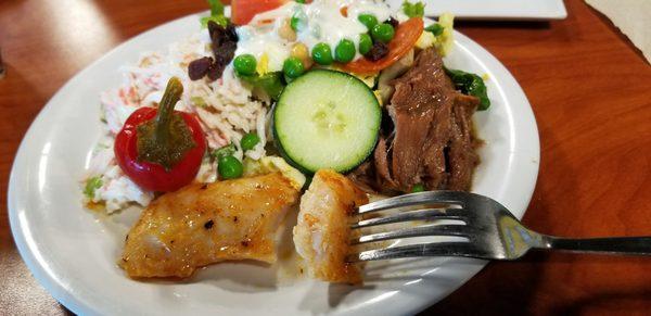 Salad with lots of fixing, love the baked fish, and the beef stew was very tender and full of flavor