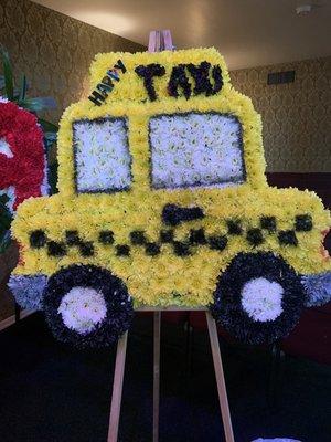 Taxi shaped floral arrangement