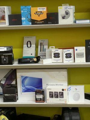 Electronics for sale including Fitbits and ear pods